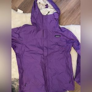 Patagonia woman’s rain coat, size large